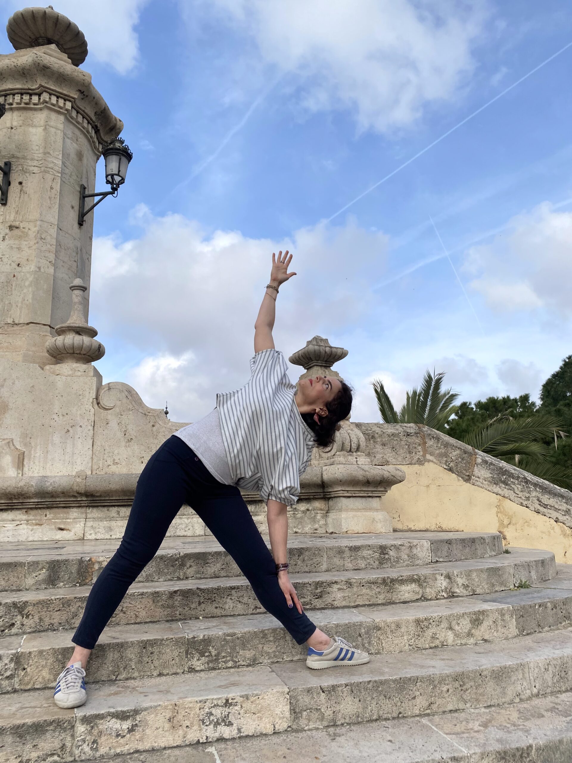 elif doing yoga in park